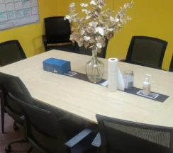 Tidy conference room after a routine janitorial cleaning.