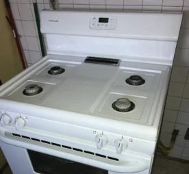Clean white stove top after a deep clean.