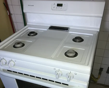 Clean white stove top after a deep clean.