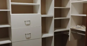Deep cleaned closet with empty shelves after a move out clean.