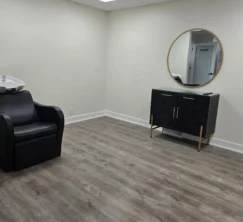 Shiny salon studio gray floor after a move-out deep clean.