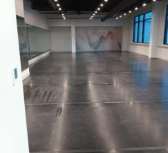 Shiny dance studio floor after a routine cleaning.