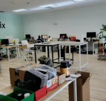 Open office with many desks after a routine clean mopping.