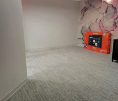 Empty office with a few boxes after a move out deep clean.