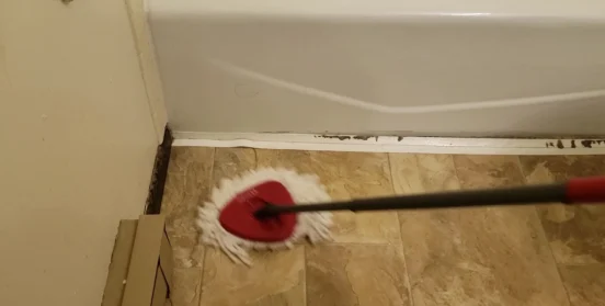 mop-bathroom Mopping a clean bathroom for a move out deep clean service.
