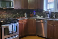 Shiny kitchen after a thorough deep clean.