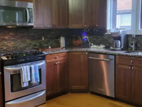 Shiny kitchen after a thorough deep clean.