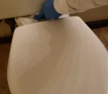 scrub-3-toilet-back Scrubbing the back of the toilet rim for a move out deep cleaning service.