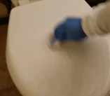 scrub-3-toilet-cover Scrubbing the toilet cover for a move out deep clean service.
