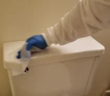 scrub-3-toilet-tank Scrubbing the toilet tank on a deep clean move out service.