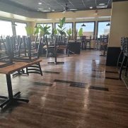 Shining dining room floor right after mopping for routine clean.