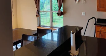 Shiny black stone counter after a routine clean.