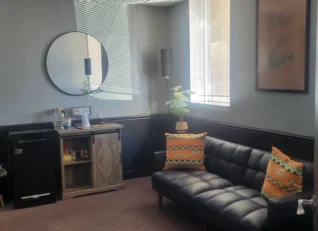 Clean and tidy waiting room for a small office.